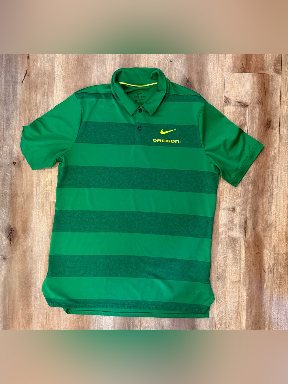 University of Oregon Nike DryFit Polo. Green Striped. Size Large.